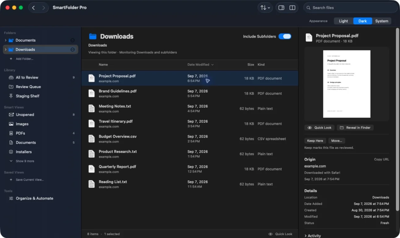 Downloads folder in dark mode with a PDF preview